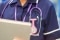 A nurse holding a clipboard